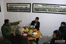 副区长李进节前看望慰问残疾人
